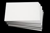 A stack of blank white business cards.