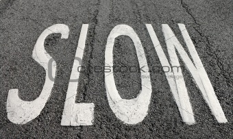 Slow sign on the road