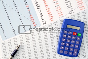 Reviewing financial numbers on a spreadsheet.