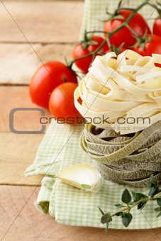 Italian pasta fettuccine with cherry tomatoes