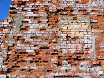 destroyed brick wall 