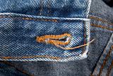 Blue jeans with buttonhole