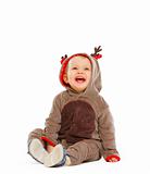 Portrait of lovely baby dressed as Santa Claus's reindeer
