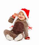 Portrait of smiling adorable baby in Santa hat

