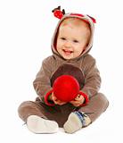 Portrait of lovely baby playing with Christmas ball
