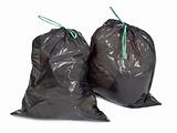 two tied garbage bags on white 