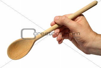 Holding an old wooden spoon with a white background.