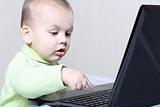child working at a computer