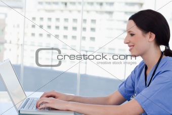 Doctor using a laptop