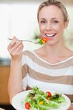 Woman eating some salad