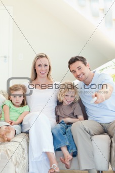 Family enjoying a movie