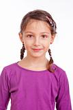 portrait of a little girl with braids - isolated on white