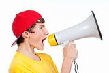 teenage boy in red baseball cap shouting in megaphone -isolated on white