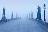 czech republic prague - charles bridge on foggy morning