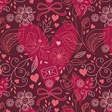 Seamless texture with hearts and flowers.