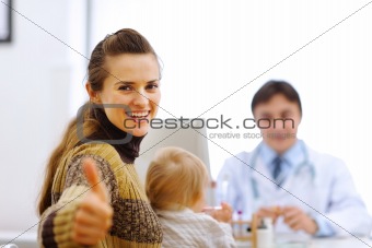 Mother with baby on consultation at pediatrician cabinet
