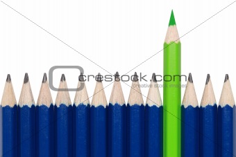 Green crayon standing out from the crowd