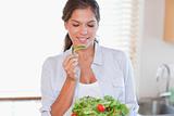Woman eating a salad