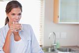 Beautiful woman drinking a glass of water
