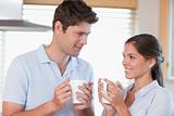 Happy couple drinking tea
