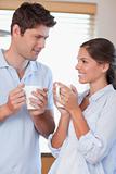 Portrait of a happy couple drinking coffee