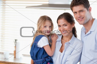 Young family posing
