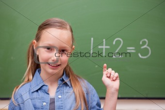 Schoolgirl raising her hand