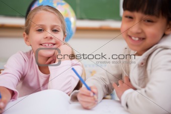 Schoolgirls doing classwork