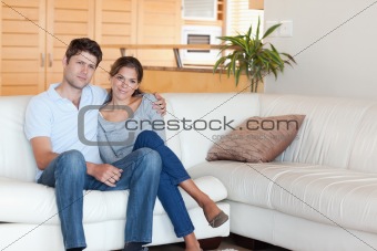 Couple sitting on a couch