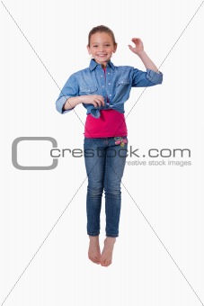 Portrait of a lovely girl jumping