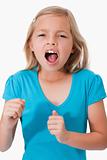 Portrait of a young girl screaming
