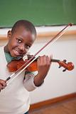 Portrait of a boy playing the violin