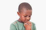 Calm boy praying
