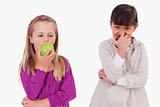Girls eating apples