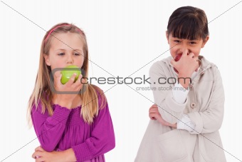 Girls eating apples
