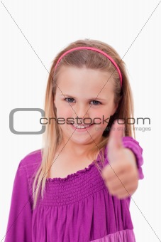 Portrait of a girl with the thumb up