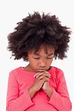 Portrait of a girl praying