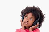 Close up of a quiet girl listening to music