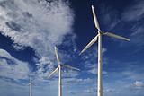 Wind turbines against a blue sky