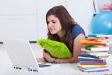 Teenager girl researching for a school project