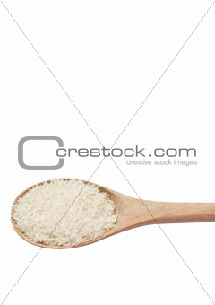 Jasmine rice on wooden scoop