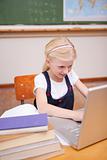 Portrait of a little girl using a laptop