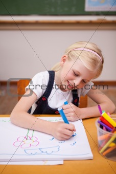 Portrait of a girl drawing