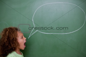 Schoolgirl screaming a speech bubble