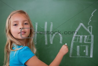 Schoolgirl learning the alphabet