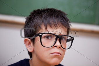 Close up of a serious schoolboy