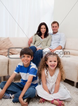 Cheerful family in the living room