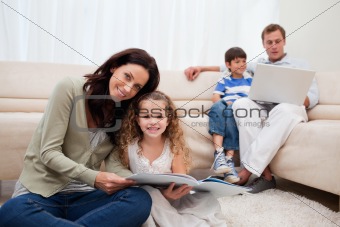 Family spending leisure time in the living room