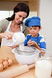 Mother and son preparing dough