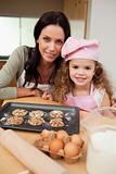 Mother and daughter with cookies